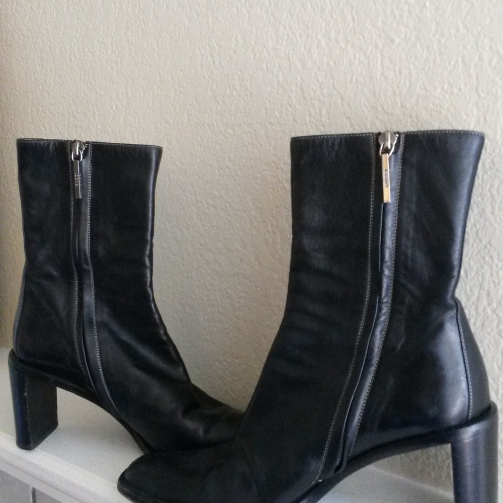 Black Gucci leather boots